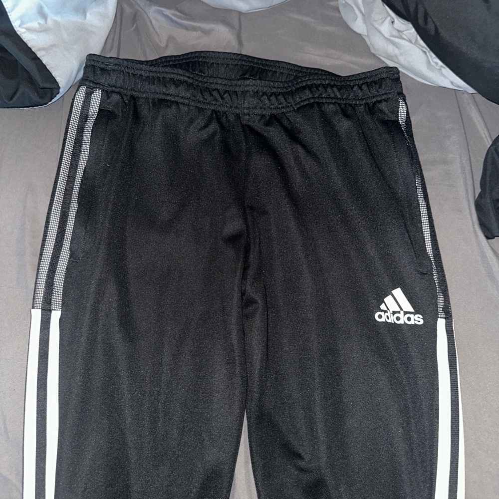 Black and white Adidas track pants